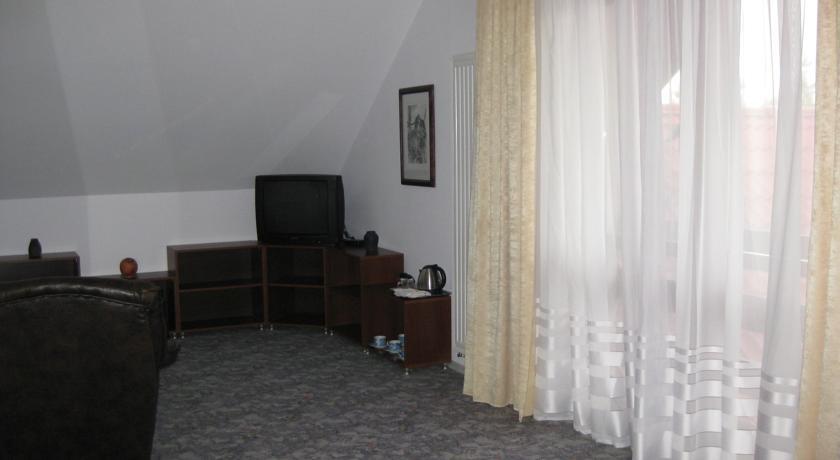 Pokoje Goscinne Pod Palmami Busko-Zdrój Rom bilde